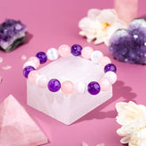 Conscious Items Trinity Bracelet of Stress Resilience featuring beads and charms designed to promote calm and resilience.