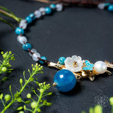 Silver anklet with three crystals representing positivity, featuring delicate chain design from Conscious Items.