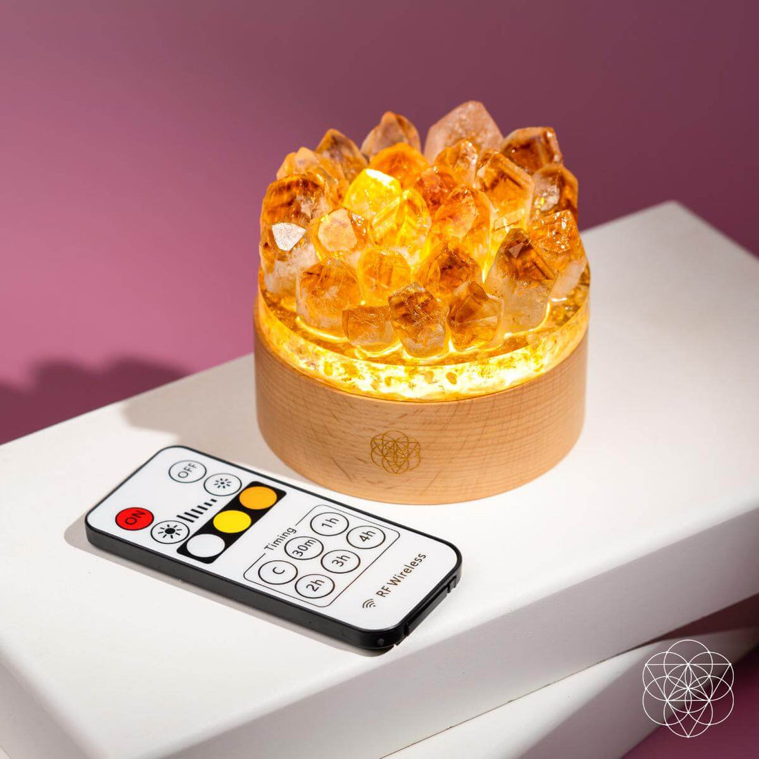 Midas Citrine Night Light by Conscious Items, featuring a glowing gold-colored lamp with a decorative design inspired by Midas.