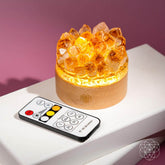 Midas Citrine Night Light by Conscious Items, featuring a glowing gold-colored lamp with a decorative design inspired by Midas.