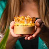 Midas Citrine Night Light by Conscious Items, featuring a golden lamp with citrine crystal design for ambient lighting.