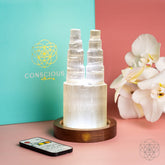 Two-tower Selenite lamp night light by Conscious Items for deep energy cleanse and reset, featuring two illuminated selenite towers.