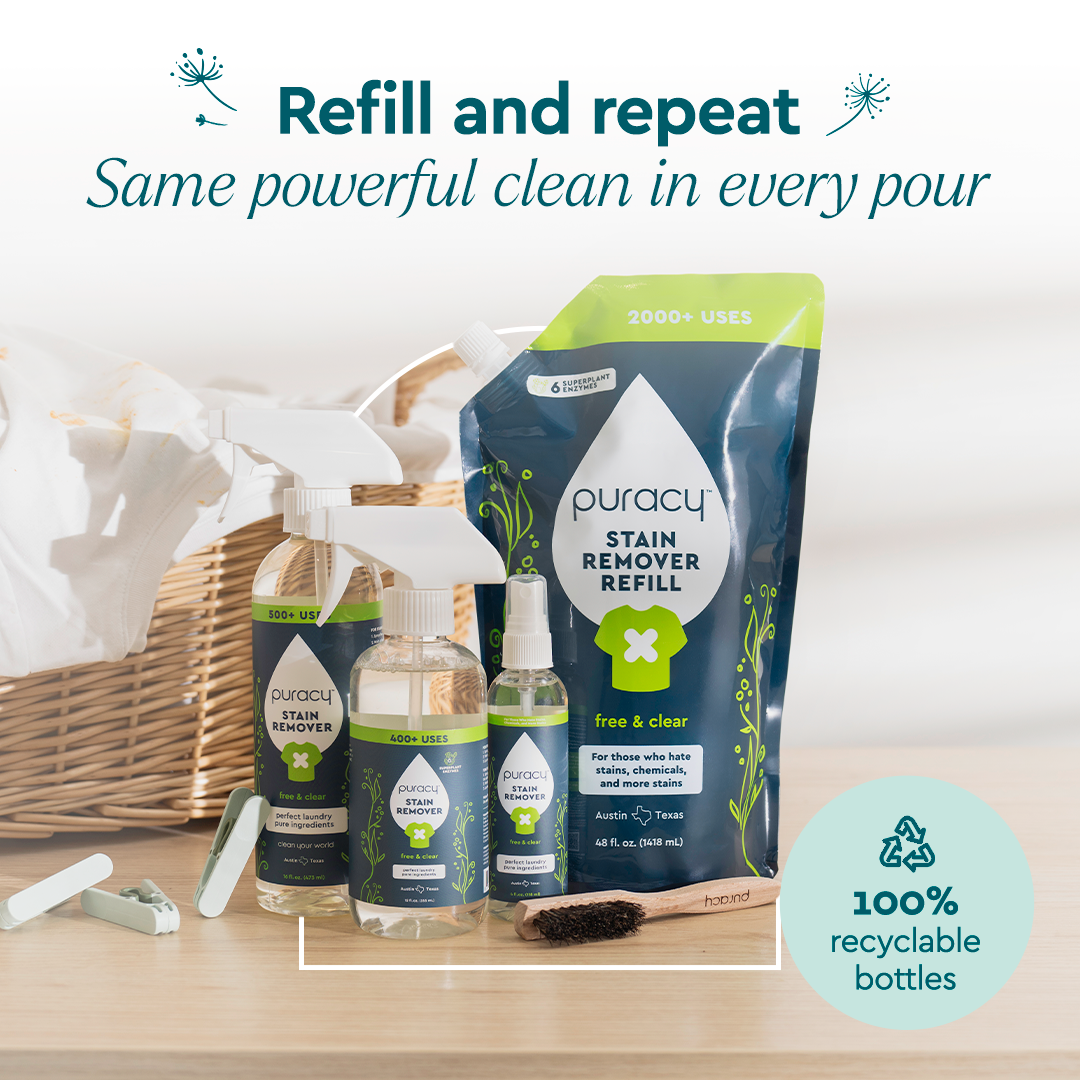 Puracy laundry stain remover bottle with spray nozzle on a white background, showcasing the stain remover product.