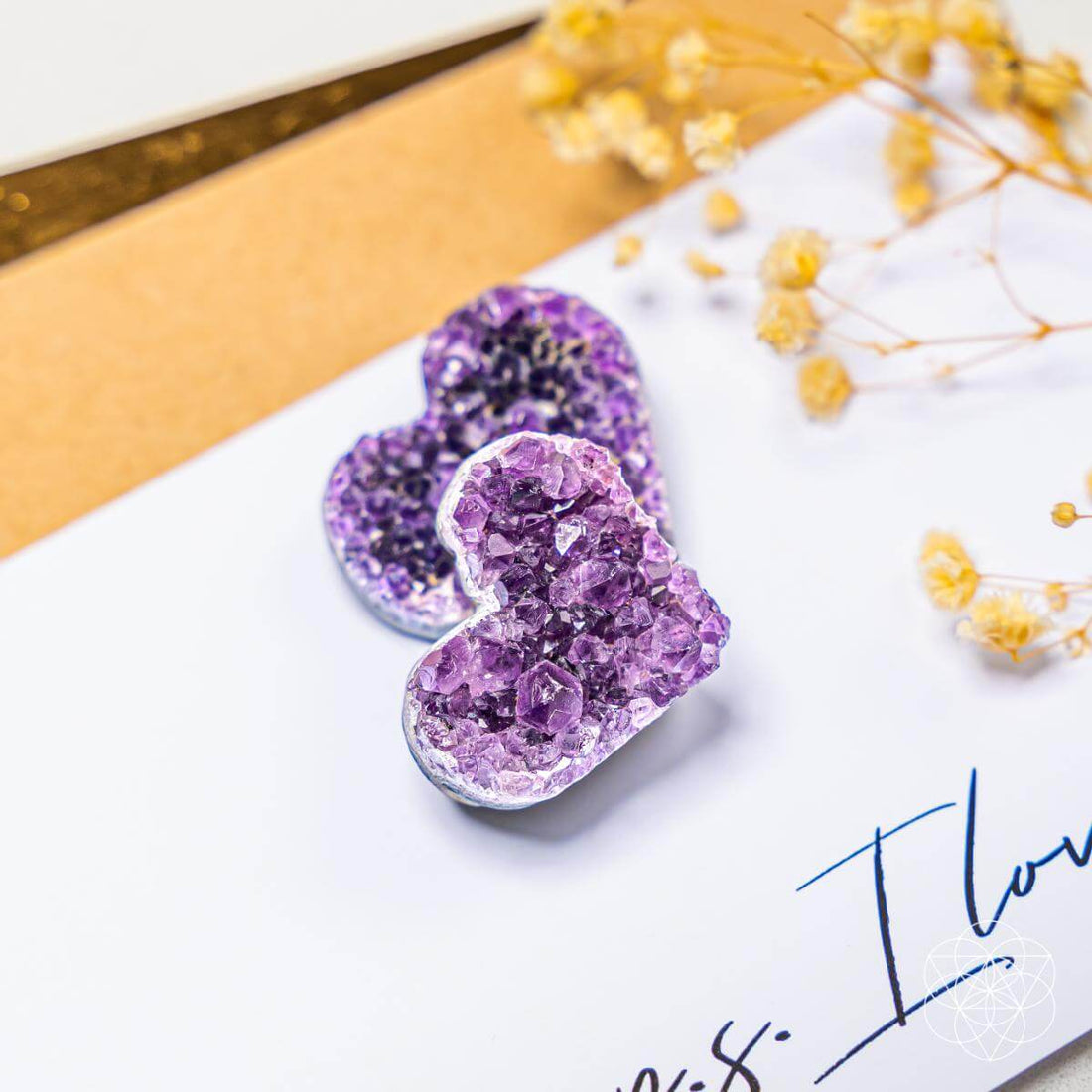 Uruguayan Amethyst Love Heart Cluster by Conscious Items, showcasing raw purple amethyst crystals in a heart shape with vibrant purple hues.