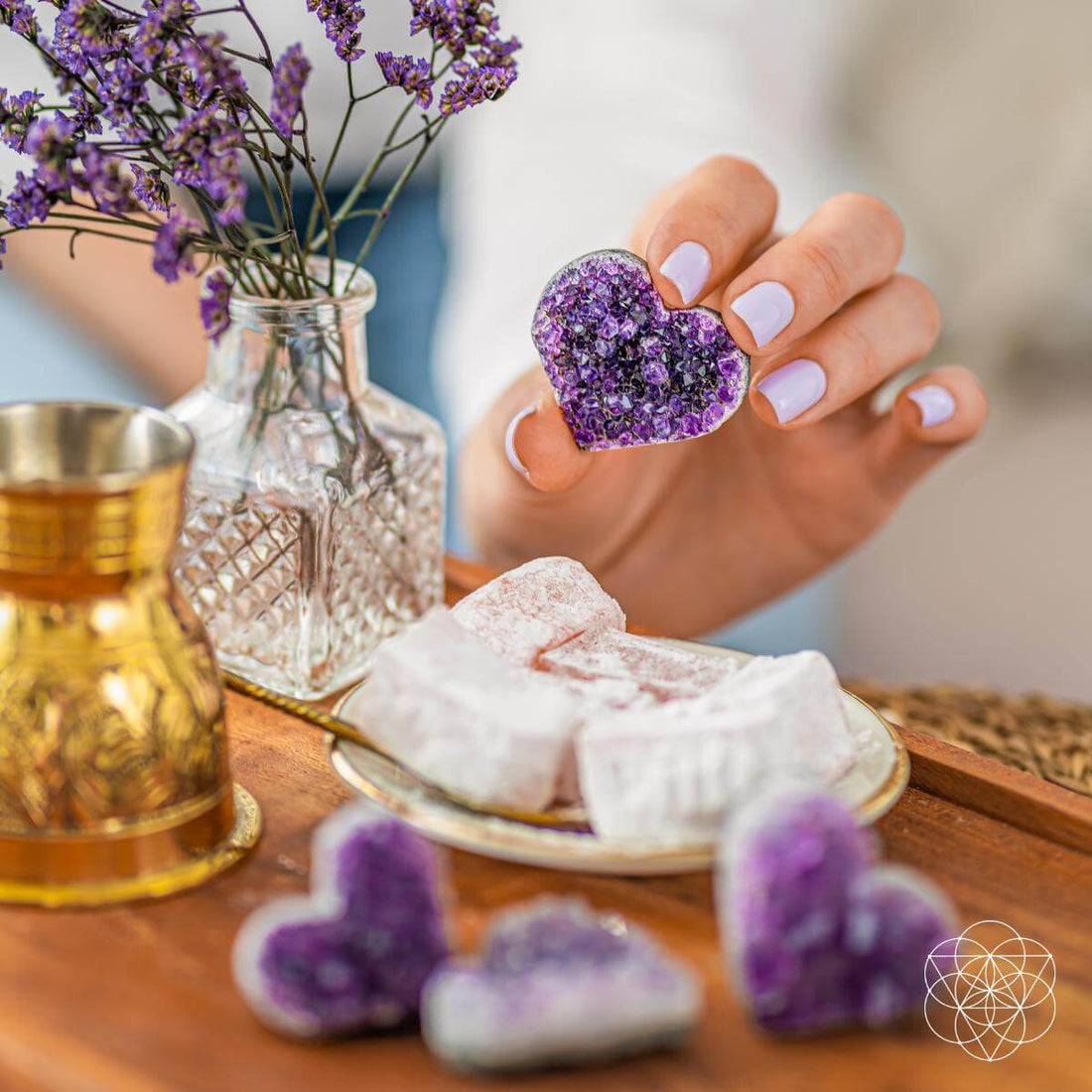 Uruguayan Amethyst love heart cluster from Conscious Items, featuring raw AAA-quality purple amethyst stones in a heart-shaped formation.