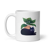 Yūjin Clothing Chilling Cat Mug featuring a relaxed cat design on a ceramic mug for cat lovers.