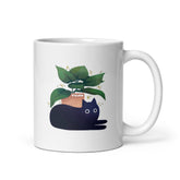 Yūjin Clothing Chilling Cat Mug featuring a playful cat design and a comfortable handle for enjoying hot beverages.
