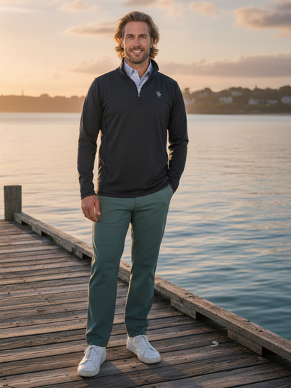 Green Seaport Pants from White Water Life, casual pants with a relaxed fit, shown on a dock setting.
