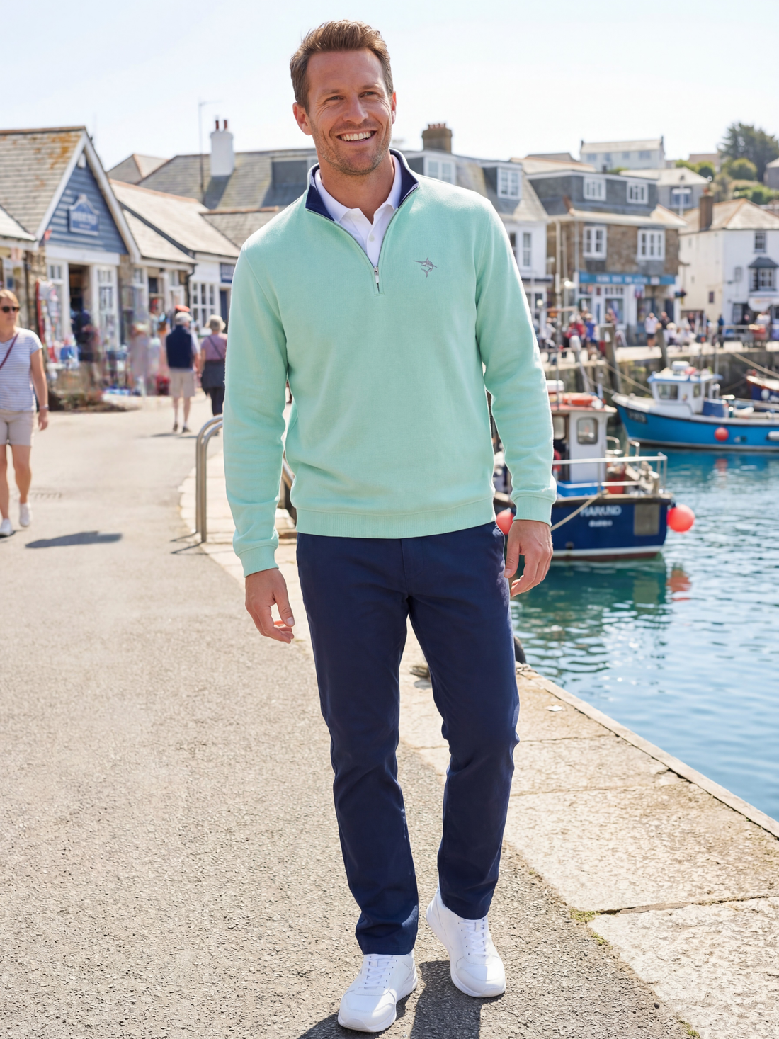 White Water Life Turnberry Aqua quarter zip knit top, smooth fabric, casual wear, with a stand-up collar and long sleeves.