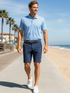 Navy Freeport Shorts by White Water Life, lightweight and comfortable performance shorts, displayed on a hanger.