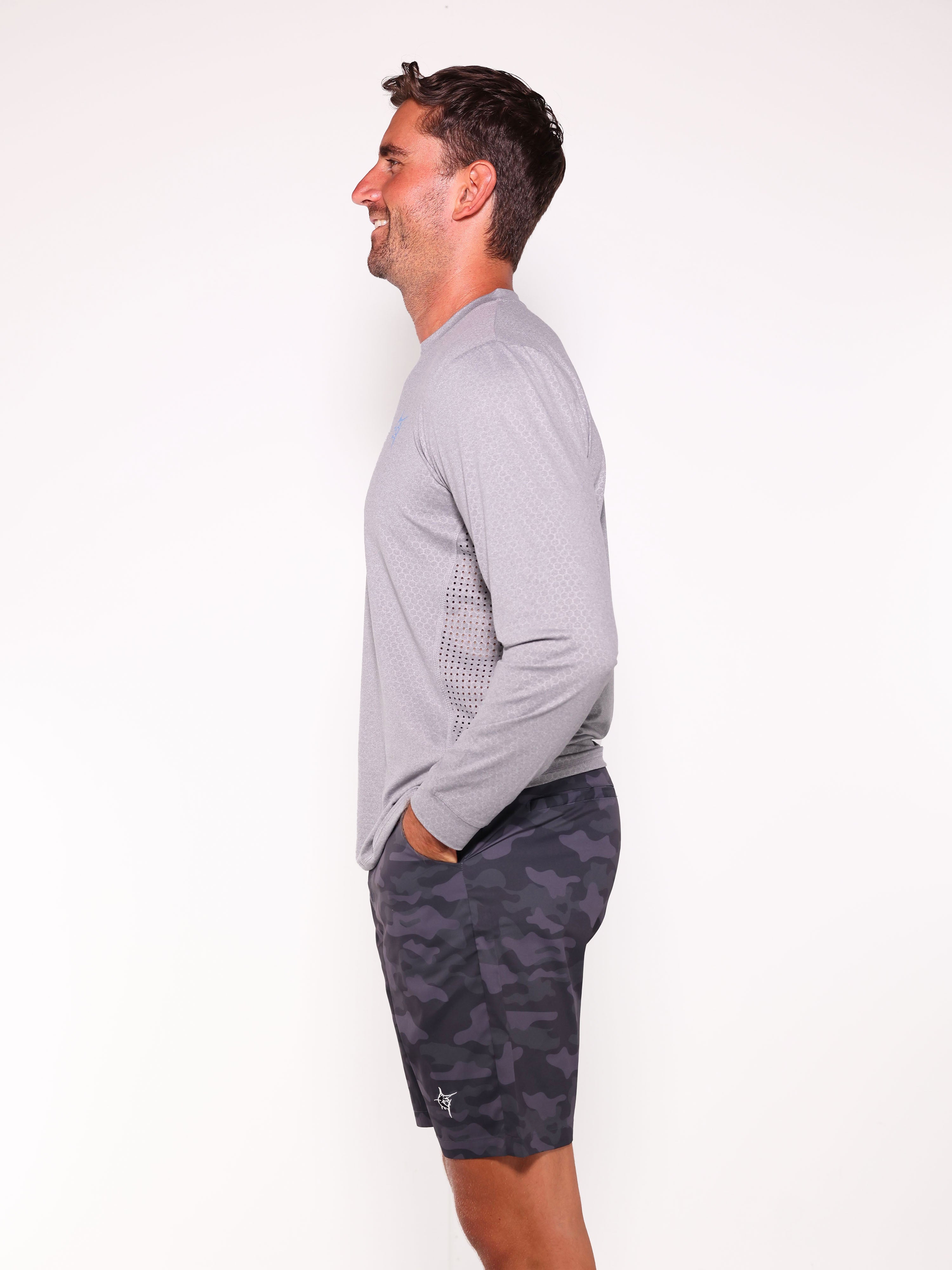 Black NautiFlex Performance Tee by White Water Life, featuring a tactical design, displayed on a flat surface.