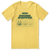Yūjin Clothing Drink Coffee Cat T-Shirt featuring a playful cat graphic and coffee design on a casual cotton T-shirt.