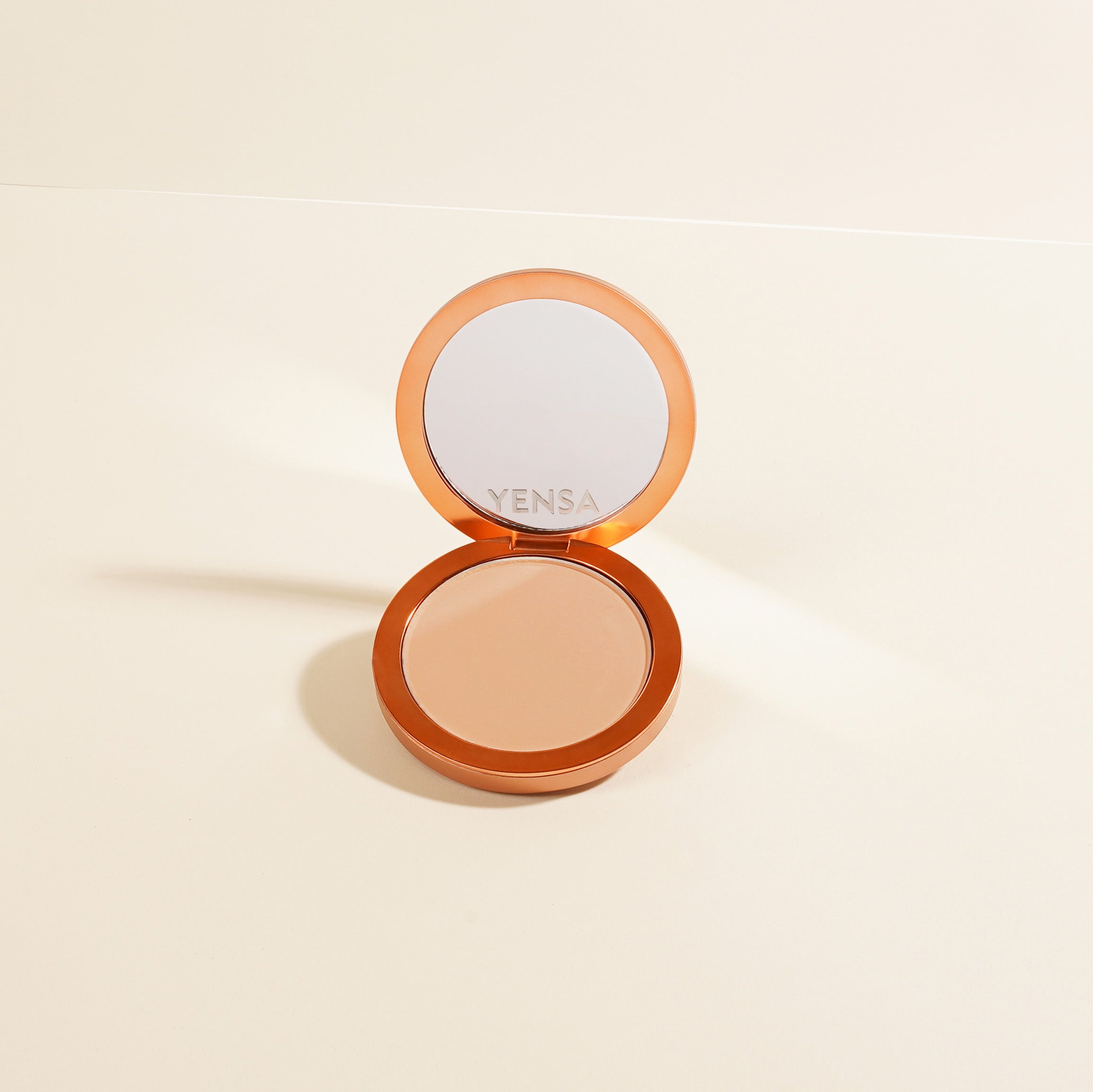 YENSA Super Serum Silk Matte Powder Foundation in Light Medium shade, pressed powder with a smooth, matte finish and peptide formula.
