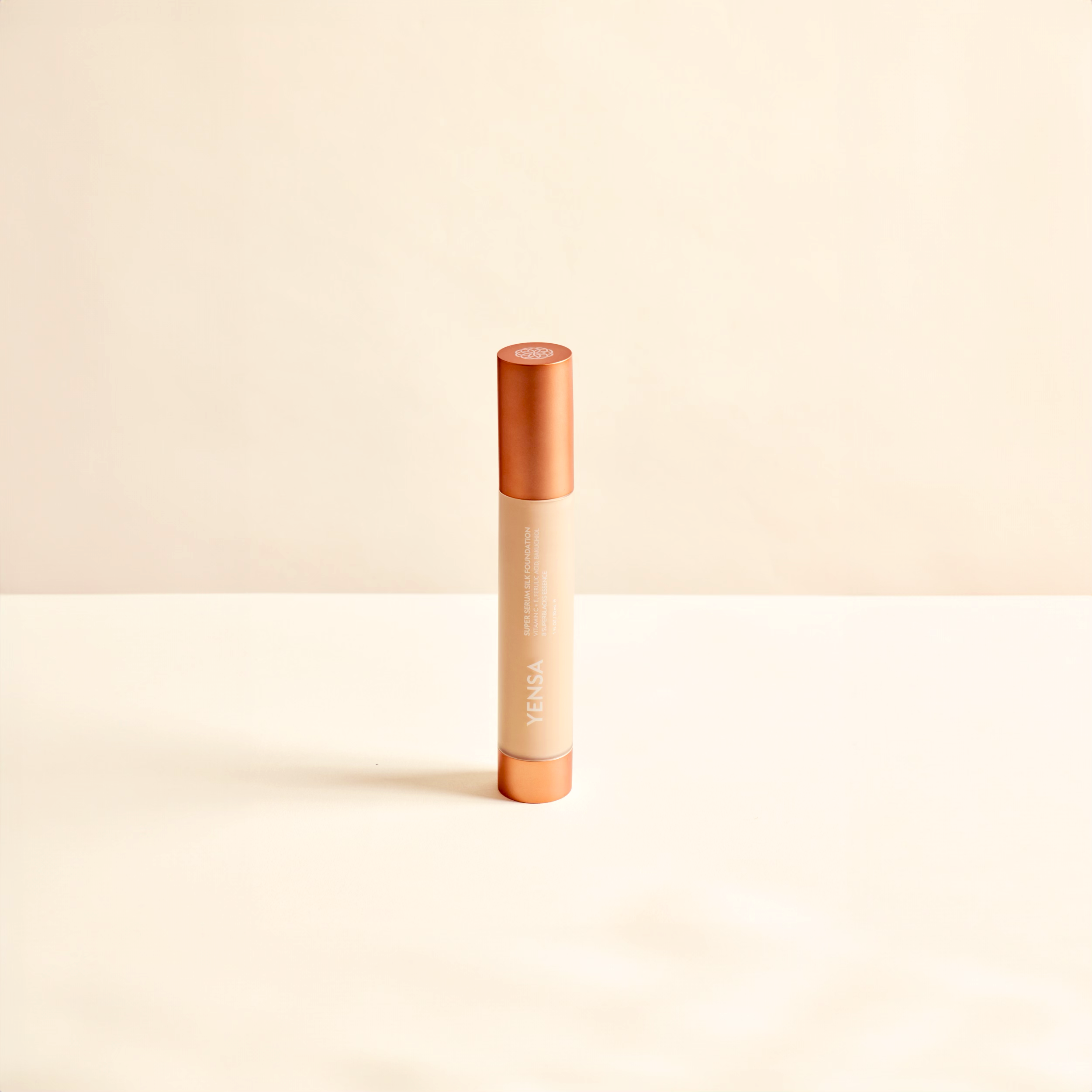 YENSA Super Serum Silk foundation bottle with a light-colored pump and label, showcasing the hydrating peptide formula for radiant skin