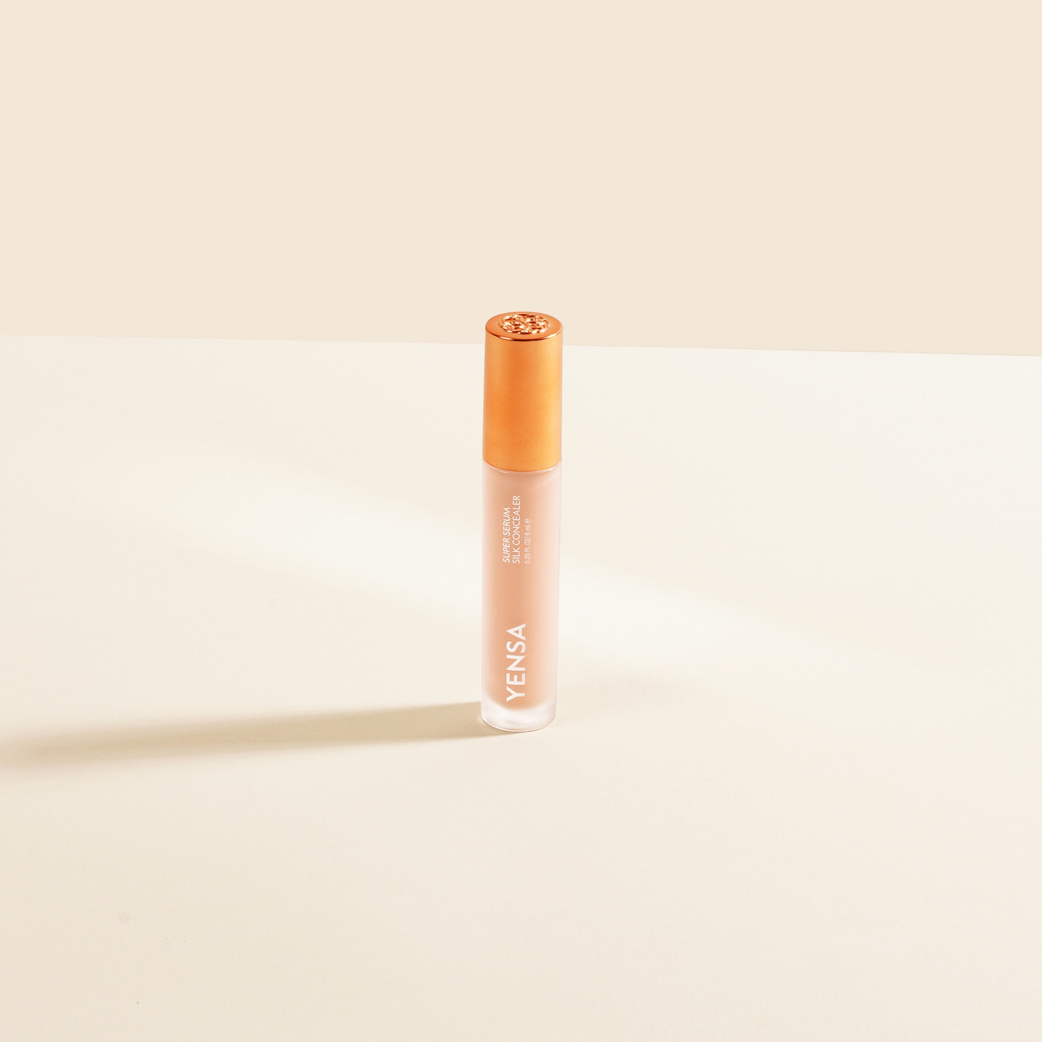 YENSA Super Serum Silk Concealer in Light 2, makeup product with smooth texture and lightweight formula, displayed on a neutral background.