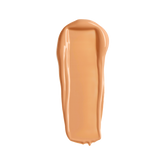 YENSA Super Serum Silk Concealer in medium warm shade, swatched on skin showing smooth, creamy makeup coverage.
