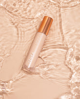 YENSA Super Serum Silk Concealer makeup tube with applicator, placed on a neutral background.