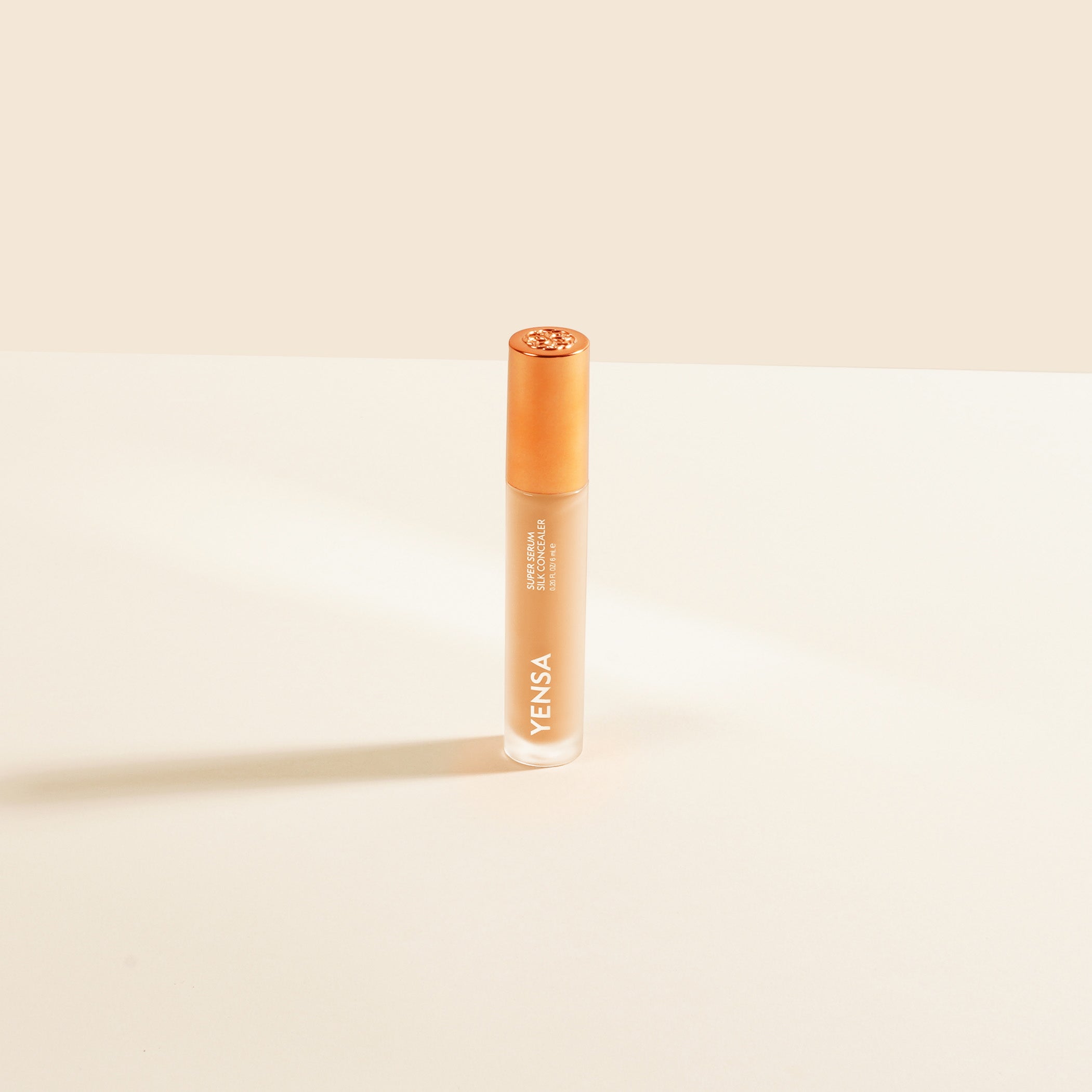 YENSA Super Serum Silk Concealer in Tan, makeup product with smooth, silky texture for flawless skin coverage.