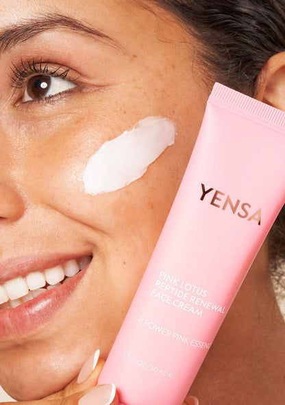 YENSA Pink Lotus Peptide Renewal Face Cream jar, skincare product with pink lotus flower design and cream inside.