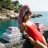 Soft Deia Australian Cotton Towels from Italic, plush and absorbent for home or bed use, shown in a cozy setting.