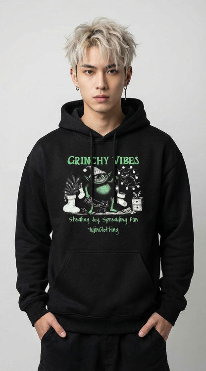 Yūjin Clothing Grinchy Vibes Christmas hoodie featuring a festive Grinch design and cozy fabric, perfect for holiday wear.