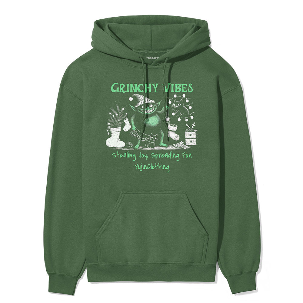 Yūjin Clothing Grinchy Vibes Christmas hoodie featuring a festive green and red design with a fun Grinch graphic.