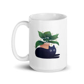 Yūjin Clothing Chilling Cat Mug featuring a relaxed cat illustration on a ceramic mug for cat lovers and coffee enthusiasts.