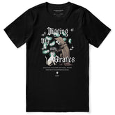Yūjin Clothing Digging My Own Graves cat T-Shirt featuring a graphic of a cat digging with bold text on a black fabric background.