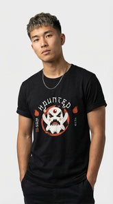 Black Haunted T-Shirt by Yūjin Clothing featuring spooky ghost graphics and eerie design on soft cotton fabric