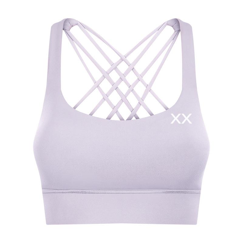 Lilac Ryla Bra by BLACKOUT BARBELL featuring a stylish design and comfortable fit, shown on a model.